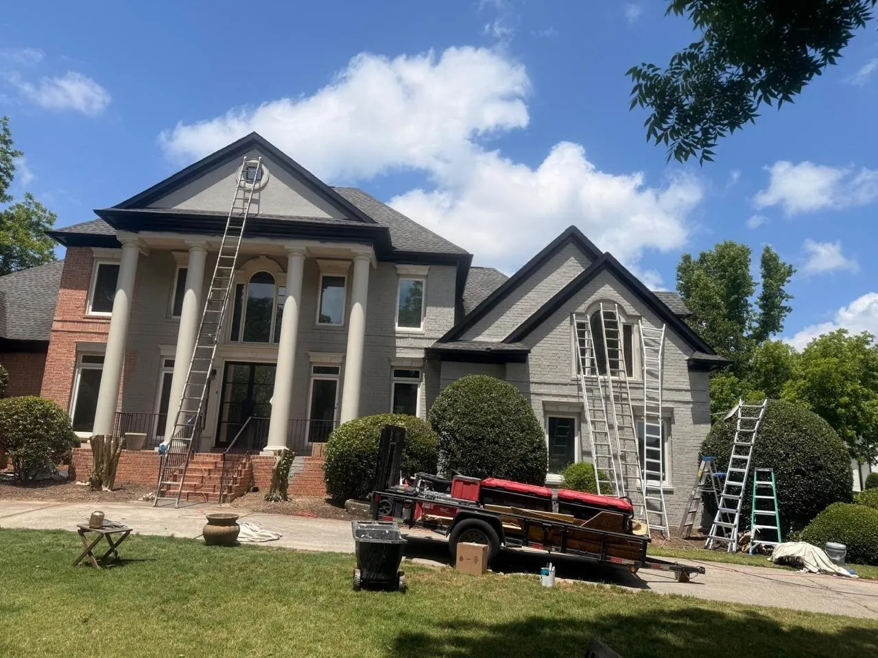 Two story home exterior painted by One Touch Painting in Georgia